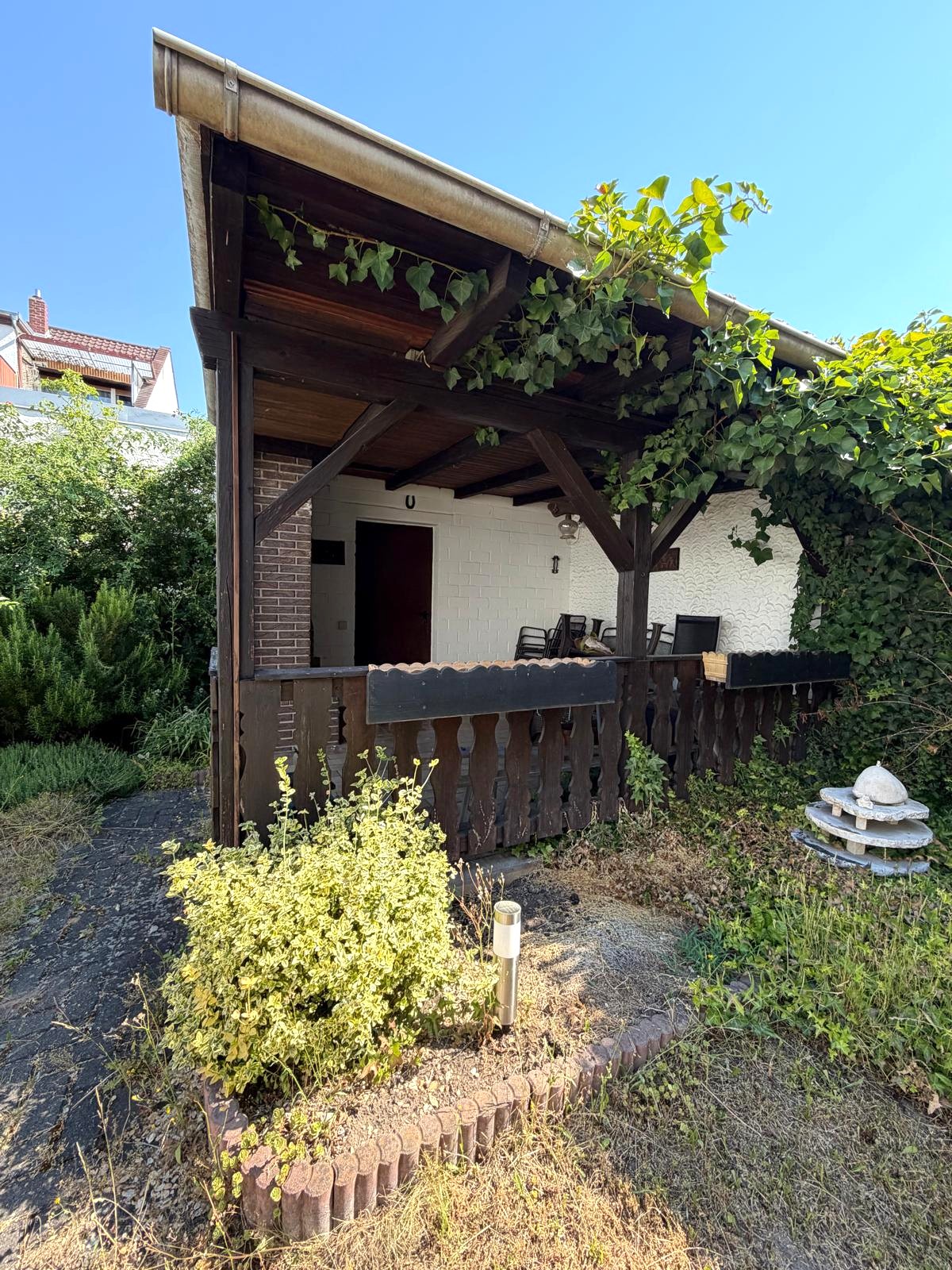 Ihr Schuppen mit überdachter Terrasse